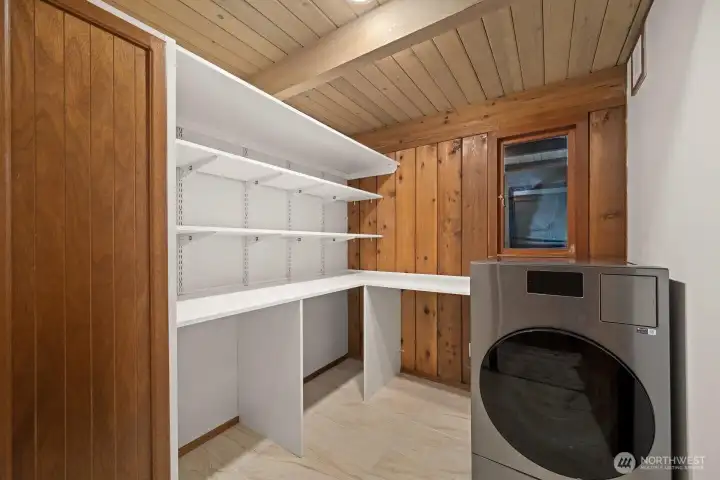 Utility Room and plenty of storage. All in One Washer and Dryer.