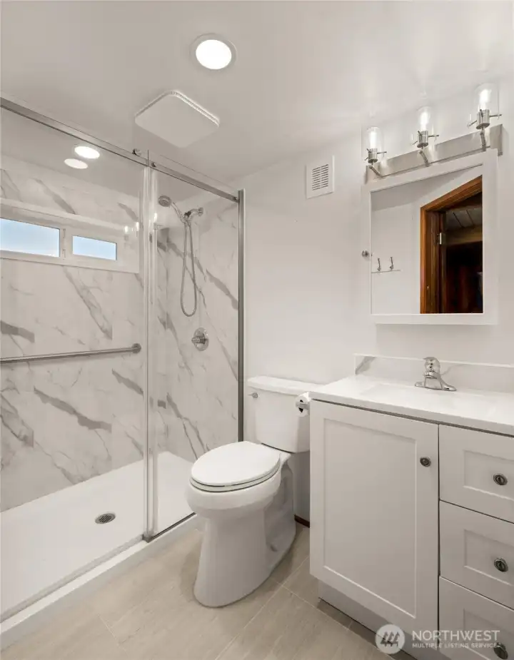Primary 3/4 bathroom with a nice large shower.