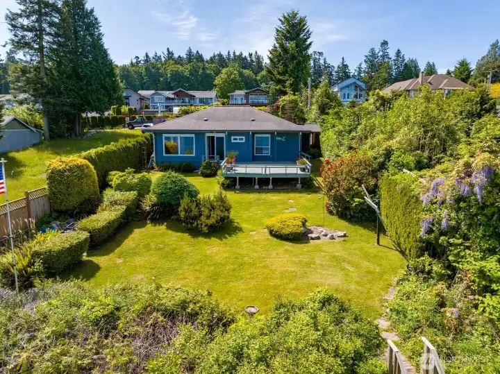 Nice yard with mature landscaping.