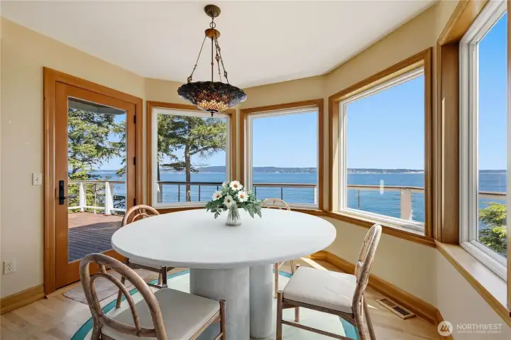 Kitchen dining space with panoramic views, tiffany style lighting and access to the deck. Bon appetite!