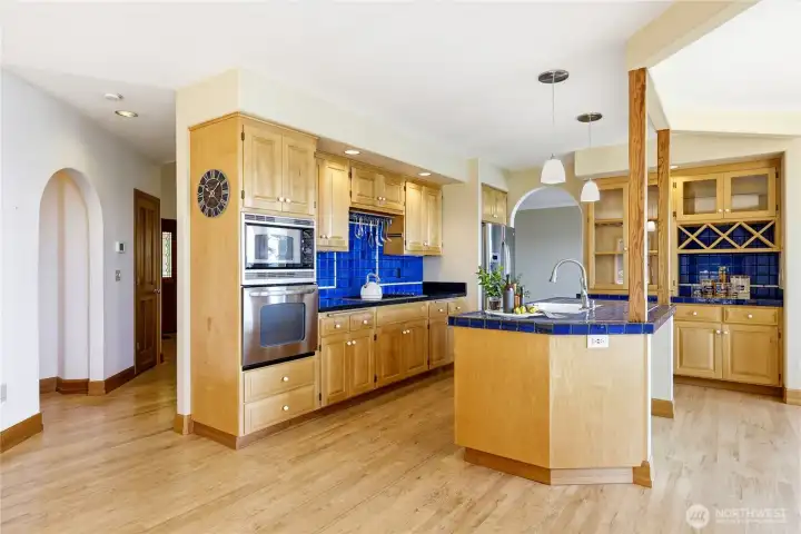 Focused on the kitchen space, equiped with all the essentials just off the dining and family rooms.