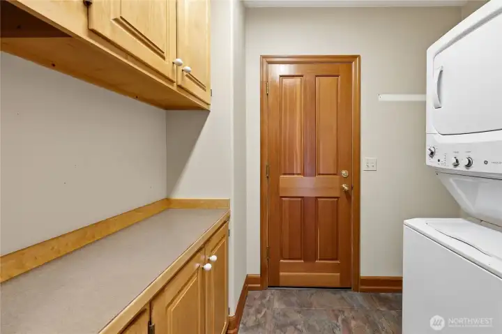 Laundry Room with access to the attached two car garage.