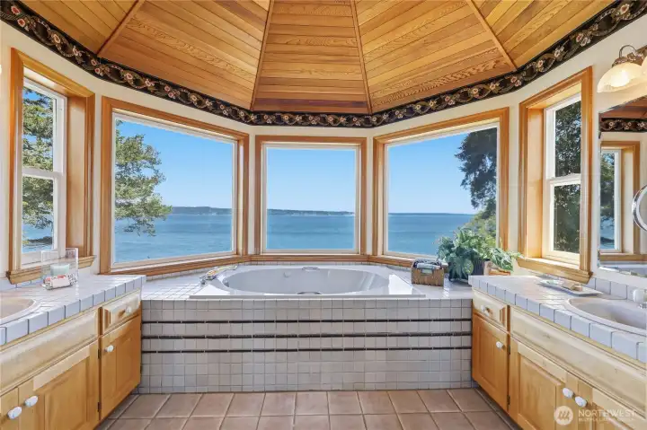 Primary ensuite has dual vanity sinks, and a jetted tub. Not pictured here is the shower and watercloset.