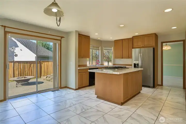 Few of the Kitchen, Large Breakfast Nook and Slider that leads to the Patio. Few of the Kitchen, Large Breakfast Nook and Slider that leads to the Patio.