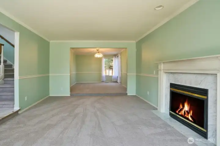 View of the Formal Living and Dining Room. New Carpets Throughout this Lovely Home. View of the Formal Living and Dining Room. New Carpets Throughout this Lovely Home.