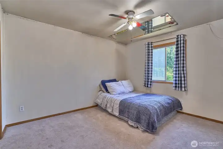 Second Bedroom with Ceiling Fan and New Carpet. Second Bedroom with Ceiling Fan and New Carpet.
