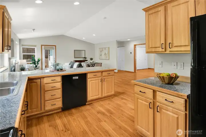 Open kitchen with stone counters- all appliances stay! New interior paint throughout!