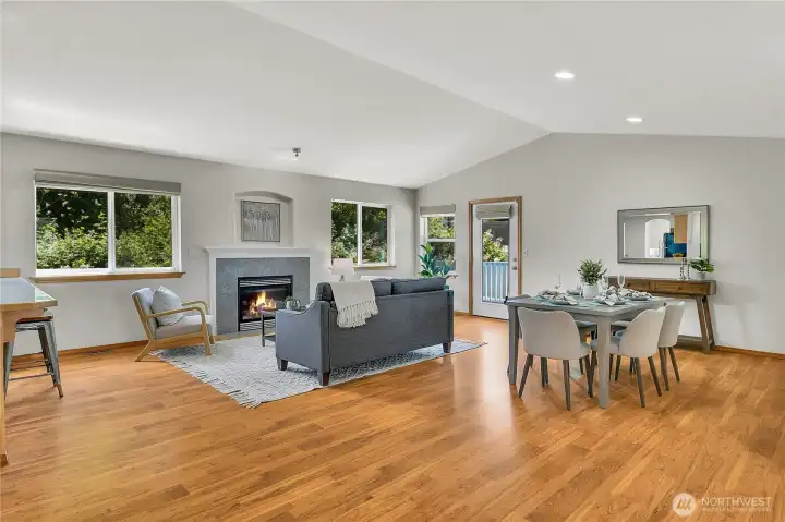 Kitchen opens to great room with vaulted ceilings, gas fireplace, and backyard patio access. Open kitchen with stone counters- all appliances stay! New interior paint throughout!