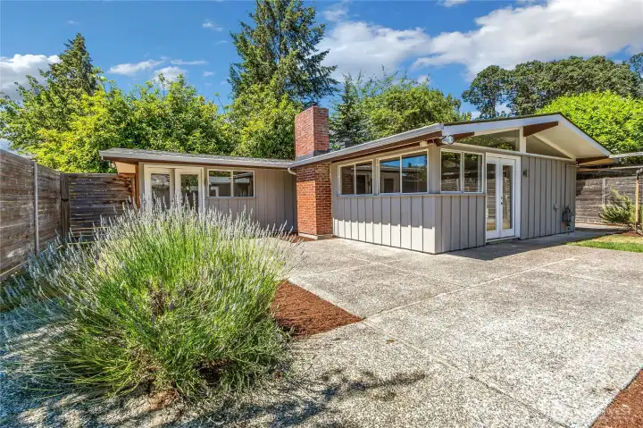 Private courtyard with a high fence for extra privacy.