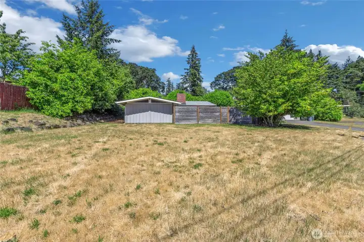 You are not limited to the courtyard area inside the fence - this property is expansive! Plenty of room to expand the fence, park your RV, plant a garden, or maybe add a DADU (Buyer to verify)! So many options!