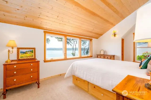 Bedroom upstairs with Sound View.  Watch the ferries sparkle as they go by at night