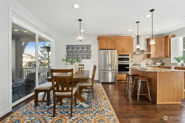 The dining area is adjacent to the kitchen for easy access