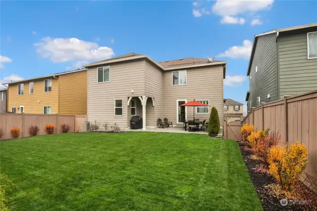 Spacious, flat, fenced backyard (shown without snow from prior listing with permission)