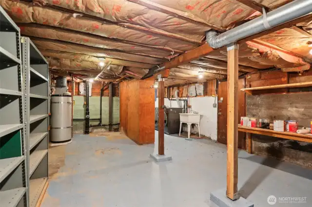 32. Basement holds washer, dryer, additional storage options, or house a workshop for the creative.