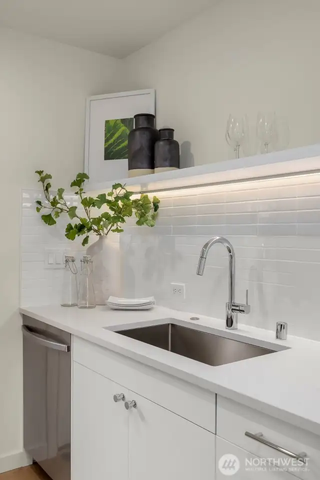 Photos of model home with similar finishes & floor plan.