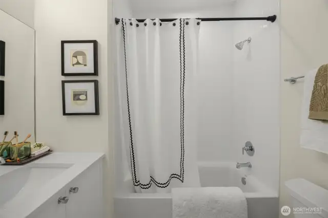 Photos of model home with similar finishes & floor plan.