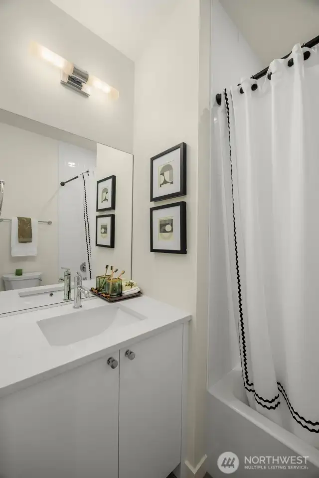 Photos of model home with similar finishes & floor plan.