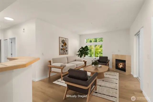 Living room *virtually staged* has great natural light