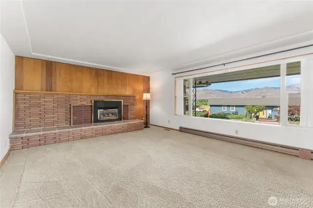 Main level living room with gas fireplace