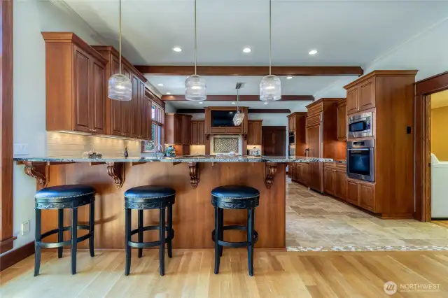 Kitchen features both counter and island seating.