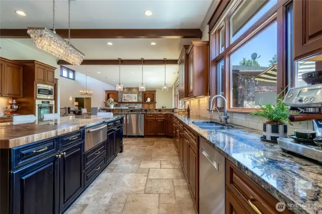 Attractive and easy to care for Travertine floors throughout the kitchen.