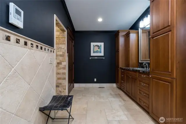 Private commode located just beyond the shower - left side