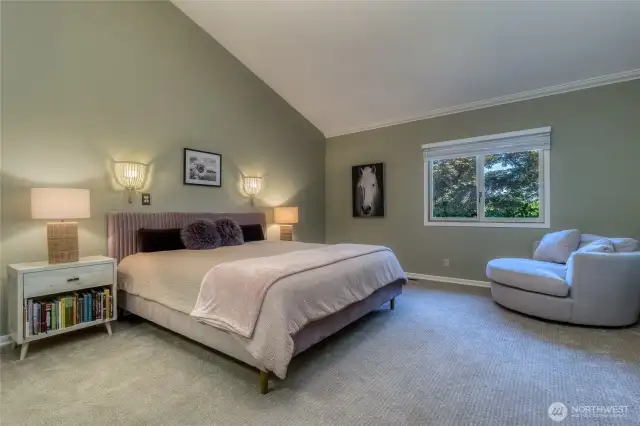 Bedroom suite #2 - located on main level features vaulted ceiling, large walk-in closet and en-suite three quarter bath with dual vanities.