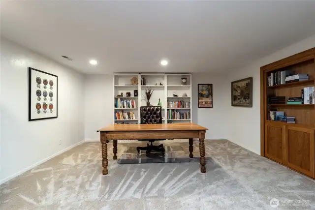 Secondary office space, with a built-in wooden bookcase that holds more than great literature!