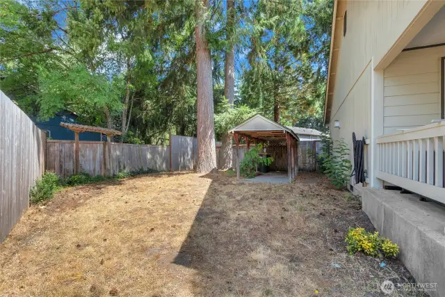 Nice sized side yard. Gazebo, fully fenced yard, mature landscaping.