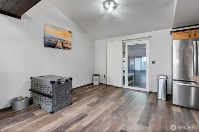 Closer view of the dining room with slider out to your sunroom