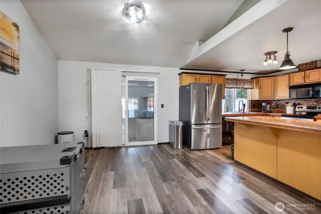 The breakfast bar is perfect for stools! New stainless steel refrigerator stays!