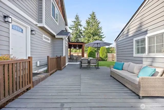 Large decking between house and garage