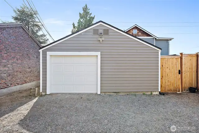 Detached garage off alley - 1-car door but potential space to add additional door for 2-car storage, or DADU potential. Click on to view the space from inside!