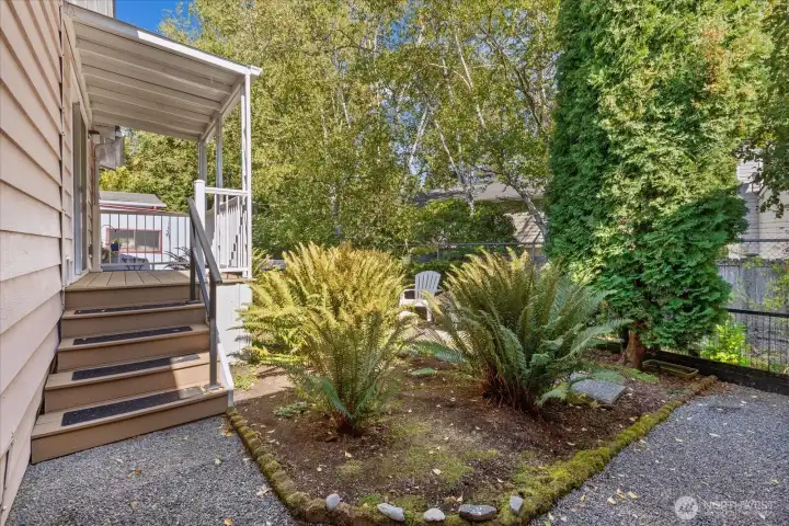 Primary Suite Bedroom Private Deck and Backyard