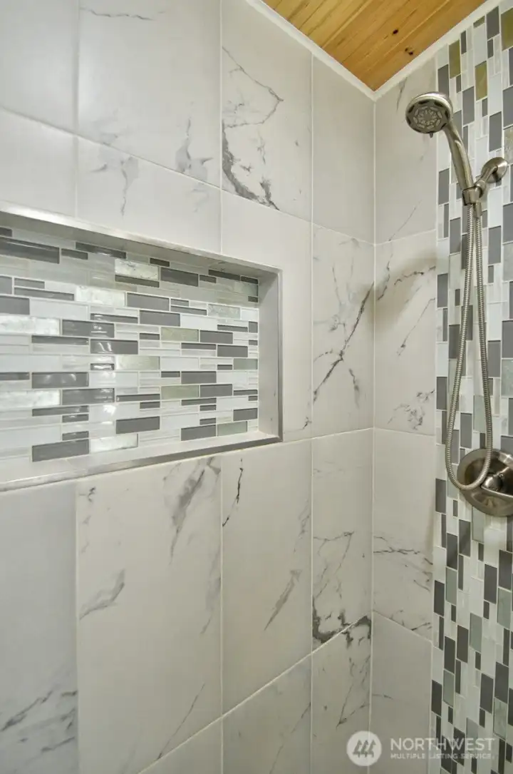 Custom tile surround shower.