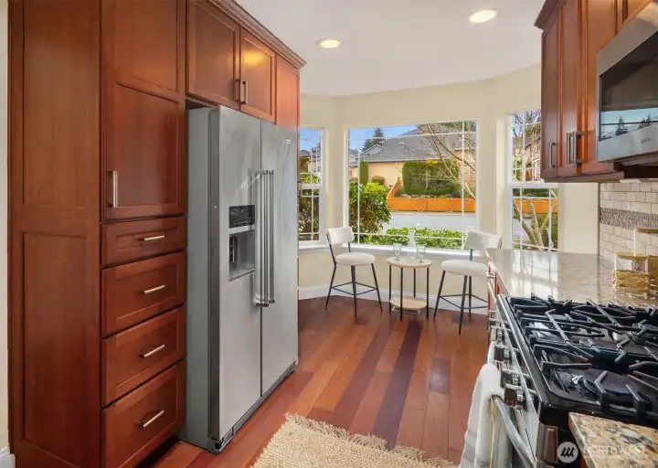 Spacious kitchen with breakfast nook.