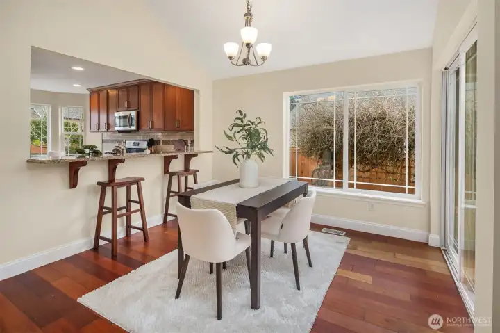 Dining area with sliding glass door access to private back patio.