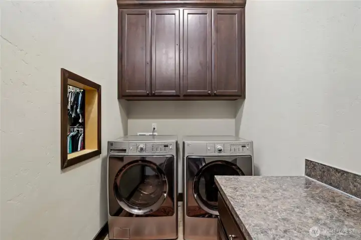 Main floor laundry with laundry shoot