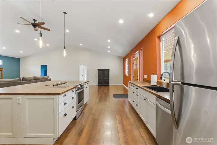 Stainless kitchen appliances included. The oven & cooktop are in the island so you can face the living room while you cook! Tons of storage in the large island.