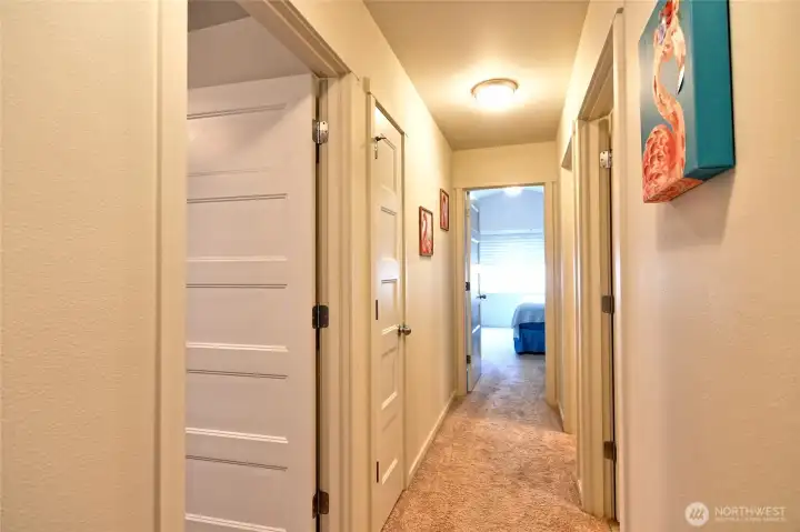 Hallway int the main floor between bderooms.