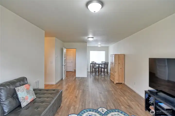 Looking to entry downstairs, small table to the right to play games.