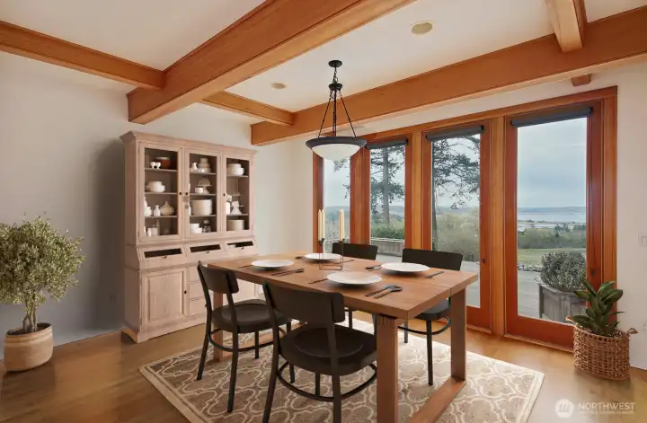 The formal dining area also has amazing views!  Virtually staged.