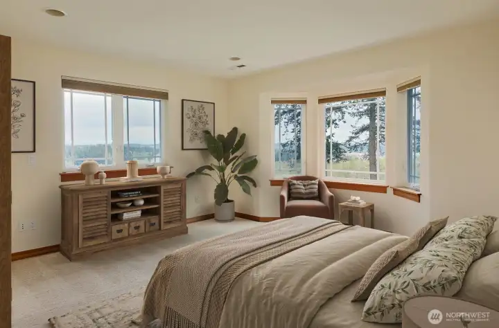 Upstairs Primary bedroom is spacious with lots of windows...Virtually Staged.