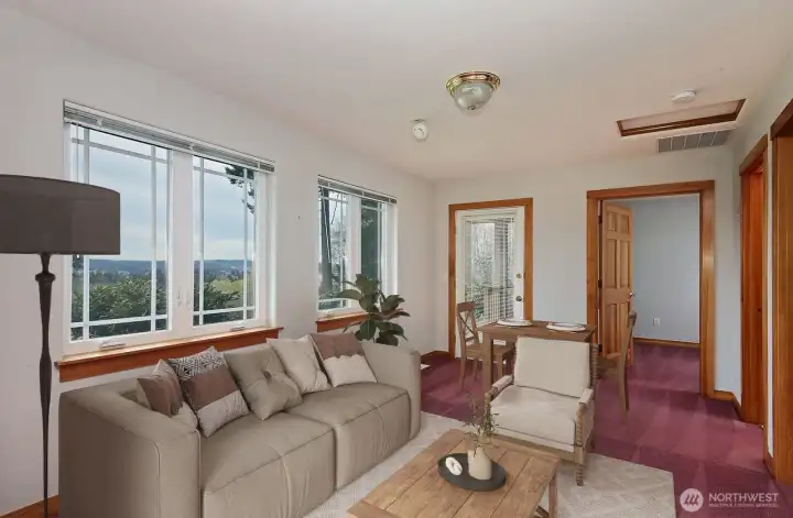 Guest House offers living area,  two rooms and a full bath.  Virtually staged.