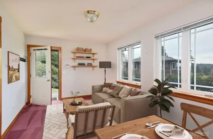 Ample sized living area enjoys territorial views and the Cascade Mountians.  Virtually staged.