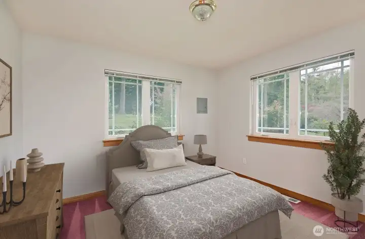 The two rooms are flexible!  One could be a bedroom and the other a den/office.  Virtually staged.