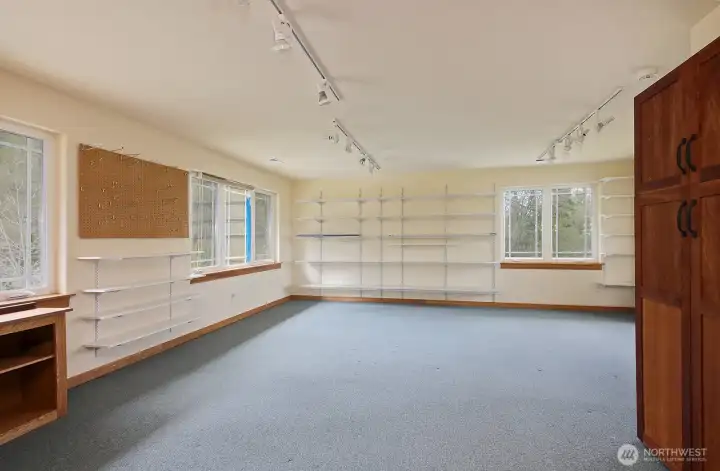 Large room upstairs was used as an artist studio.  Home business, work out space, craft room or art studio...music room maybe!?