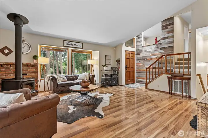 View from dining towards front entrance and access to upper and lower levels. Nothing but trees and beauty through the windows. No immediate neighbors View from dining towards front entrance and access to upper and lower levels. Nothing but trees and beauty through the windows. No immediate neighbors