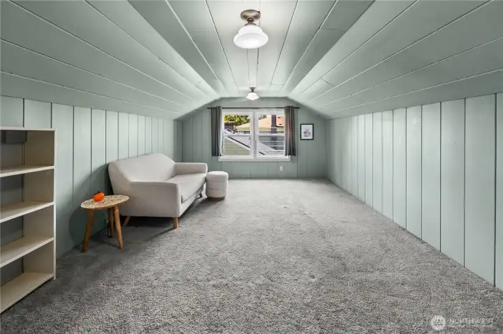 Upper-level bonus room with half bath creates the perfect flex space for home office, media room, or playroom.