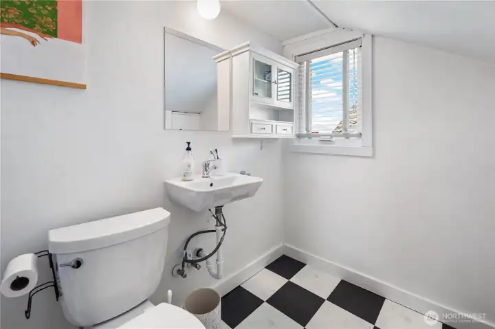 Conveniently placed half bath on the upper level.